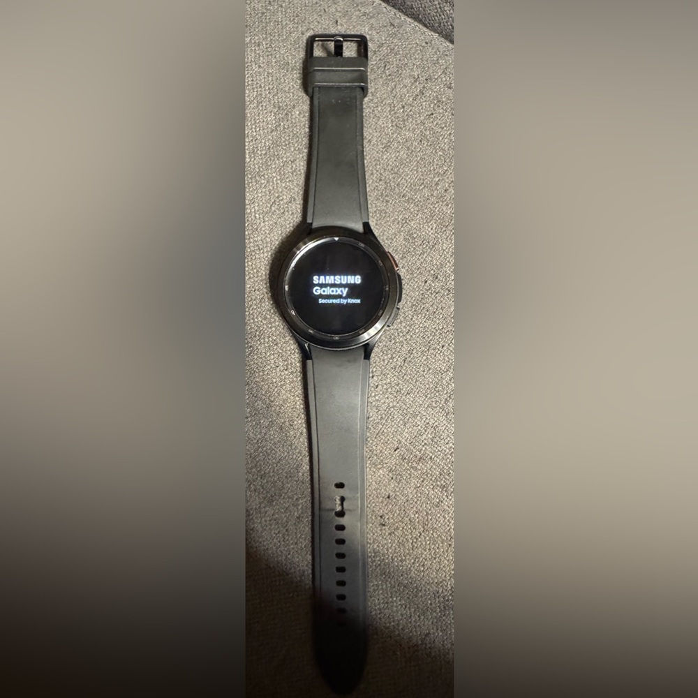 Samsung Galaxy Watch 4 with charger